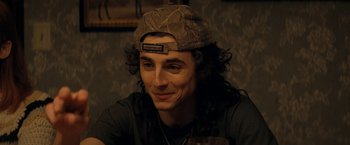 Movie still from “Don't Look Up” (2021), directed by Adam McKay – A person wearing a hat; Close Up shot, Over the shoulder angle