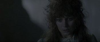 Movie still from “Dracula” (1979), directed by John Badham – A person wearing a white shirt; Close Up shot, Over the shoulder angle