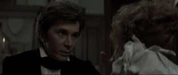 Movie still from “Dracula” (1979), directed by John Badham – A man and a woman are looking at one another; Close Up shot, Over the shoulder angle