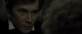 Movie still from “Dracula” (1979), directed by John Badham – A person looking at the camera; Close Up shot, Over the shoulder angle