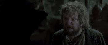 Movie still from “Dracula” (1979), directed by John Badham – A person wearing a suit and tie; Close Up shot, Over the shoulder angle