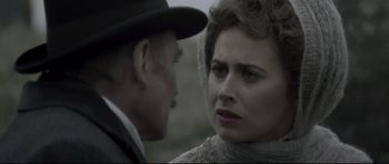 Movie still from “Dracula” (1979), directed by John Badham – An older man and a younger woman face to face; Close Up shot, Over the shoulder angle