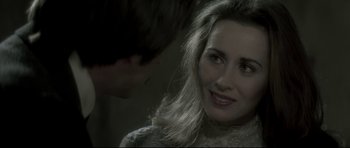 Movie still from “Dracula” (1979), directed by John Badham – A man and a woman looking at one another; Close Up shot, Over the shoulder angle