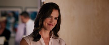 Movie still from “Draft Day” (2014), directed by Ivan Reitman – A person wearing a white shirt; Close Up shot, Over the shoulder angle