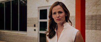 Movie still from “Draft Day” (2014), directed by Ivan Reitman – A person wearing a white shirt; Close Up shot, Over the shoulder angle