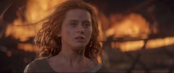 Movie still from “DragonHeart” (1996), directed by Rob Cohen – A person with long red hair; Close Up shot, Low angle
