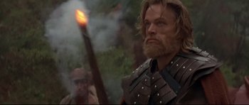 Movie still from “DragonHeart” (1996), directed by Rob Cohen – A person with a sword; Close Up shot, Low angle