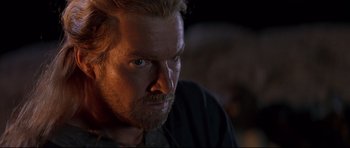 Movie still from “DragonHeart” (1996), directed by Rob Cohen – A person with a beard; Close Up shot, Over the shoulder angle