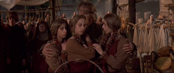 Movie still from “DragonHeart” (1996), directed by Rob Cohen – A group of young people standing next to each other; Medium shot, High angle