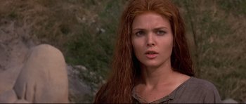 Movie still from “DragonHeart” (1996), directed by Rob Cohen – A person with long red hair; Close Up shot, Over the shoulder angle