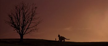 Movie still from “DragonHeart” (1996), directed by Rob Cohen – An animal that is running on a hill; Extreme Wide shot, Low angle