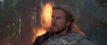 Movie still from “DragonHeart” (1996), directed by Rob Cohen – A person wearing a helmet; Close Up shot, Low angle