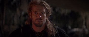 Movie still from “DragonHeart” (1996), directed by Rob Cohen – A person with long hair; Close Up shot, Over the shoulder angle