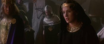 Movie still from “Dragonslayer” (1981), directed by Matthew Robbins – A man and a woman dressed in medieval garb; Medium shot, Over the shoulder angle