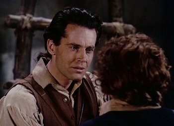 Movie still from “Drums Along the Mohawk” (1939), directed by John Ford – A person talking to another person; Close Up shot, Over the shoulder angle