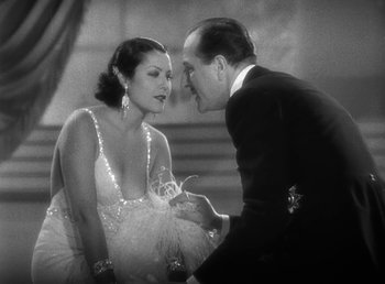 Movie still from “Duck Soup” (1933), directed by Leo McCarey – A man and a woman are talking to each other; Medium shot, Low angle