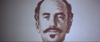 Movie still from “Duck, You Sucker!” (1971), directed by Sergio Leone – An image of an old man with a mustache; Extreme Close Up shot, Low angle