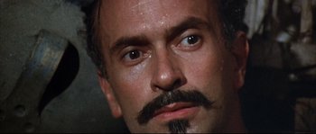 Movie still from “Duck, You Sucker!” (1971), directed by Sergio Leone – A man with a mustache; Close Up shot, High angle