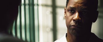 Movie still from “Deja Vu” (2006), directed by Tony Scott – Denzel washington's face as he stares into the distance; Close Up shot, Over the shoulder angle