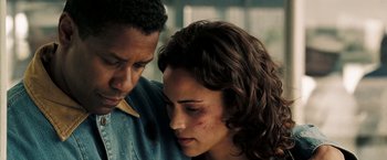 Movie still from “Deja Vu” (2006), directed by Tony Scott – A man and a woman looking at one another; Close Up shot, Low angle