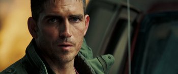 Movie still from “Deja Vu” (2006), directed by Tony Scott – A person wearing a jacket; Close Up shot, Over the shoulder angle