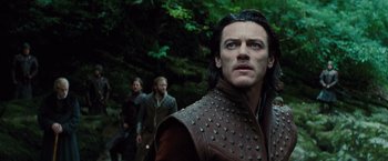 Movie still from “Dracula Untold” (2014), directed by Gary Shore – A person wearing a leather jacket; Close Up shot, Low angle