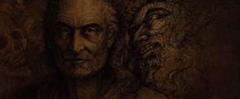 Movie still from “Dracula Untold” (2014), directed by Gary Shore – An old man with long hair and a bearded face; Extreme Close Up shot, Overhead angle