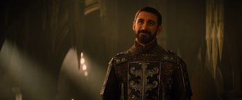 Movie still from “Dracula Untold” (2014), directed by Gary Shore – A man with a long beard wearing armor; Close Up shot, Over the shoulder angle