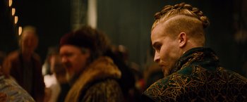 Movie still from “Dracula Untold” (2014), directed by Gary Shore – A person with long hair; Close Up shot, Over the shoulder angle