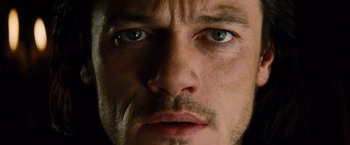 Movie still from “Dracula Untold” (2014), directed by Gary Shore – A man's face with blue eyes; Extreme Close Up shot, High angle