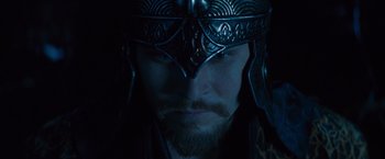 Movie still from “Dracula Untold” (2014), directed by Gary Shore – A person wearing a helmet; Close Up shot, High angle