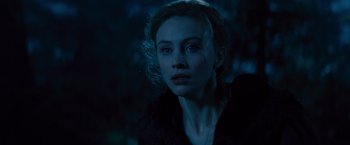 Movie still from “Dracula Untold” (2014), directed by Gary Shore – A woman in a black jacket is in the dark; Close Up shot, Low angle