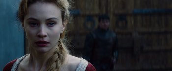Movie still from “Dracula Untold” (2014), directed by Gary Shore – A person wearing a red dress; Close Up shot, Over the shoulder angle
