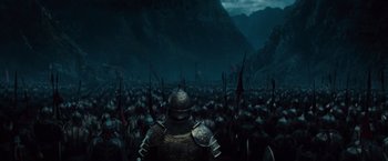 Movie still from “Dracula Untold” (2014), directed by Gary Shore – A large crowd of people in the middle of the night; Extreme Wide shot, High angle