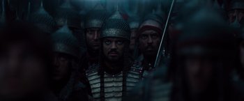 Movie still from “Dracula Untold” (2014), directed by Gary Shore – A group of men in medieval armor and helmets; Close Up shot, Over the shoulder angle