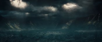 Movie still from “Dracula Untold” (2014), directed by Gary Shore – A dark cloudy sky with some light shining through; Extreme Wide shot, High angle
