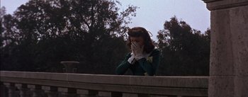 Movie still from “Désirée” (1954), directed by Henry Koster – A woman covering her face with her hands; Medium shot, Low angle