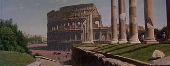 Movie still from “Désirée” (1954), directed by Henry Koster – A painting of the roman colosseum with horses in the foreground; Extreme Wide shot, High angle