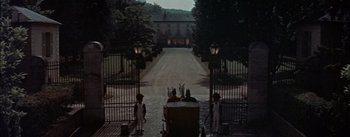 Movie still from “Désirée” (1954), directed by Henry Koster – A group of people standing in front of an entrance to a building; Wide shot, High angle
