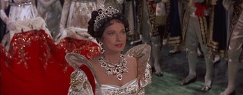 Movie still from “Désirée” (1954), directed by Henry Koster – A person wearing a dress and a tiara; Close Up shot, High angle