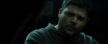 Movie still from “Eagle Eye” (2008), directed by D.J. Caruso – A person with a beard; Close Up shot, Over the shoulder angle