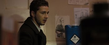 Movie still from “Eagle Eye” (2008), directed by D.J. Caruso – Shia labeouf in a scene from the movie lawless; Close Up shot, Over the shoulder angle