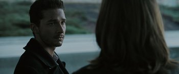 Movie still from “Eagle Eye” (2008), directed by D.J. Caruso – A person talking to another person; Close Up shot, Over the shoulder angle