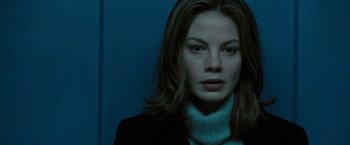 Movie still from “Eagle Eye” (2008), directed by D.J. Caruso – A person wearing a jacket; Close Up shot, Low angle