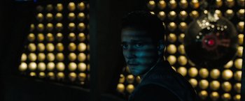 Movie still from “Eagle Eye” (2008), directed by D.J. Caruso – A person wearing a jacket; Close Up shot, Low angle