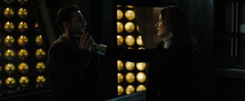 Movie still from “Eagle Eye” (2008), directed by D.J. Caruso – A man and a woman are talking to each other; Medium shot, Over the shoulder angle