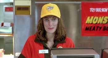 Movie still from “Eagle vs Shark” (2007), directed by Taika Waititi – A woman wearing a yellow hat and a red shirt; Close Up shot, Low angle