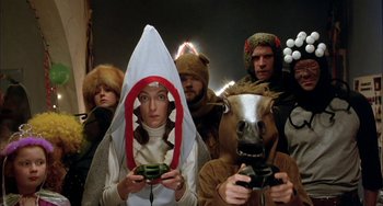 Movie still from “Eagle vs Shark” (2007), directed by Taika Waititi – A group of people dressed up in costumes for halloween; Medium shot, Overhead angle