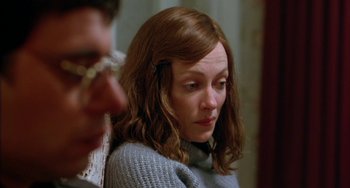 Movie still from “Eagle vs Shark” (2007), directed by Taika Waititi – A woman sitting in front of a man; Close Up shot, Over the shoulder angle