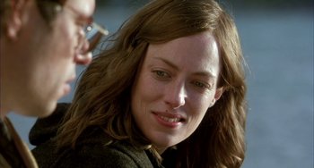 Movie still from “Eagle vs Shark” (2007), directed by Taika Waititi – A person with long brown hair; Close Up shot, Over the shoulder angle